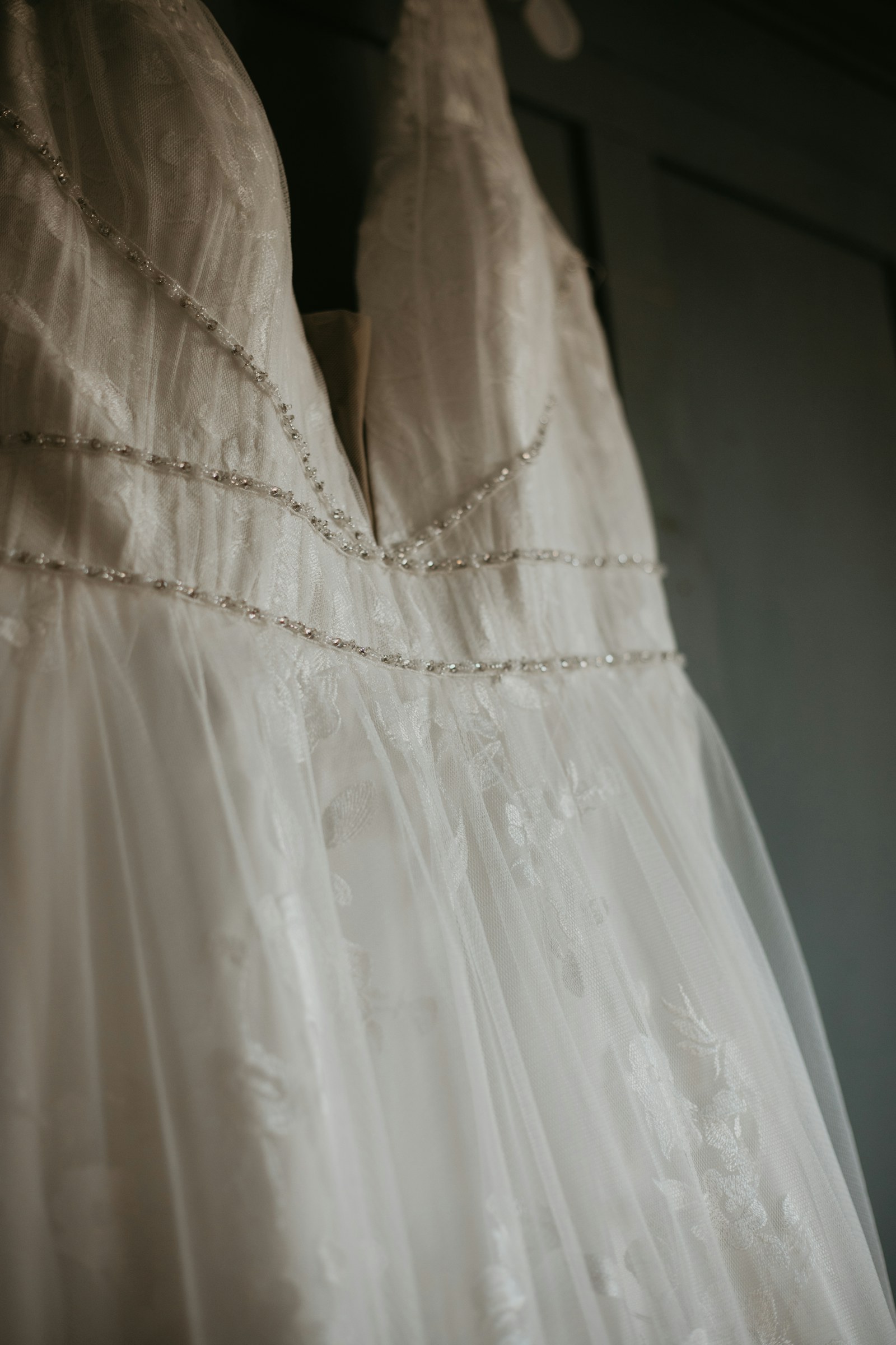 Detailed view of a wedding dress fabric ready for delicate garment care